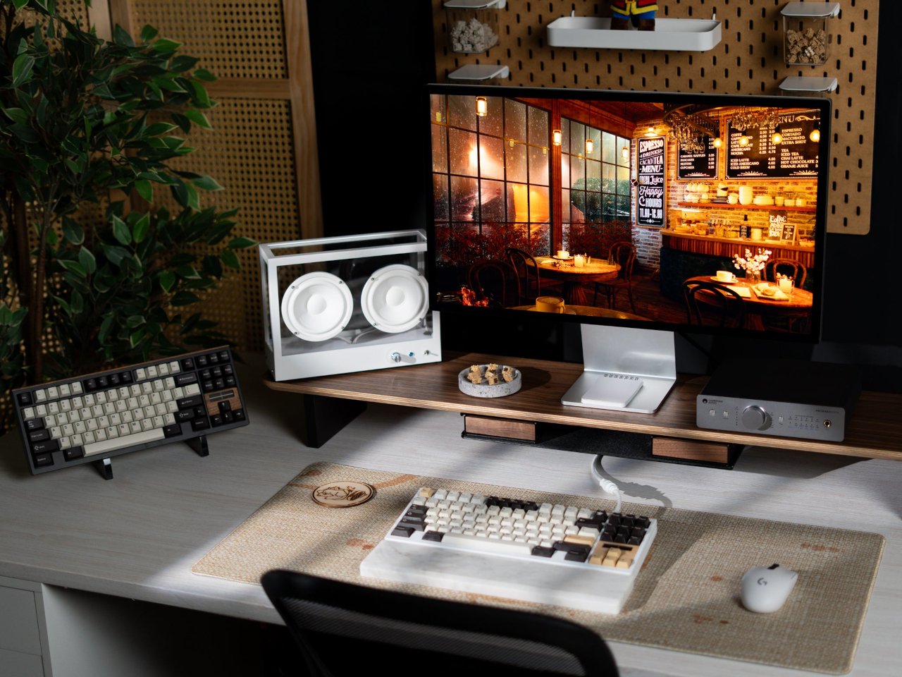 A premium modern mechanical keyboard and desktop setup with ambient lighting