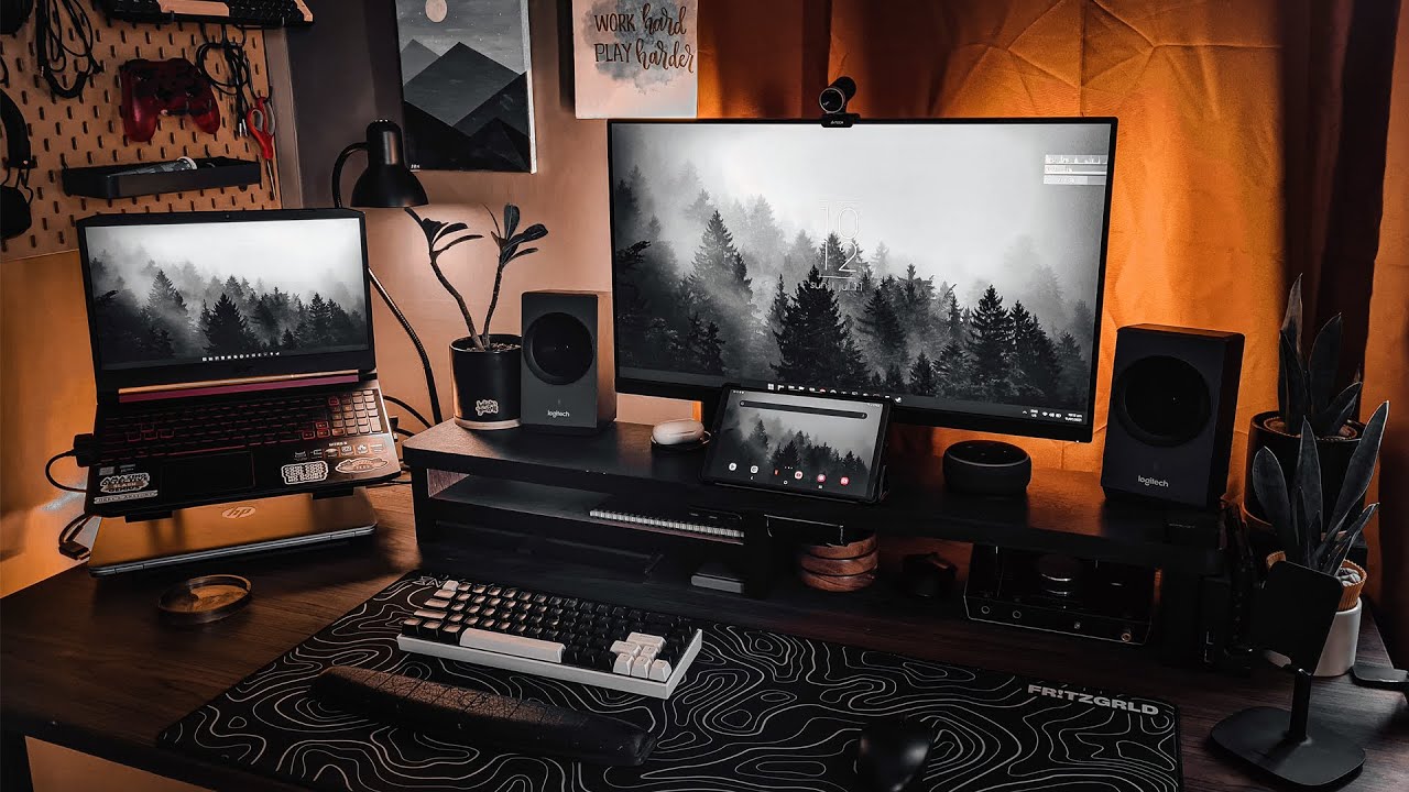 A technician analyzing real-time GPU hardware performance graphs on a desktop monitor